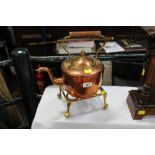 Brass trivet and copper kettle