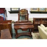 A Victorian mahogany dressing table, height 160 cm, width 116 cm,