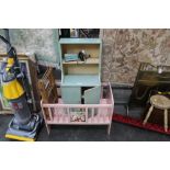 Toy cot and cupboard,
