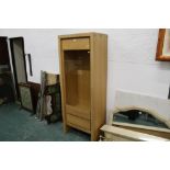 A light oak display cabinet with drawer to base