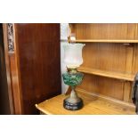 Converted Victorian lamp with green glass painted reservoir, chimney and shade, +/- 59 cm high.