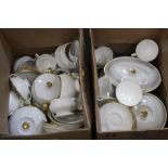 Two boxes of white china with gilded edges, mixture of Worcester, Wedgwood and others.