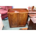 A Victorian mahogany cupboard with rear upstand, height 99 cm, width 97 cm,