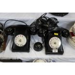 Two vintage black telephones