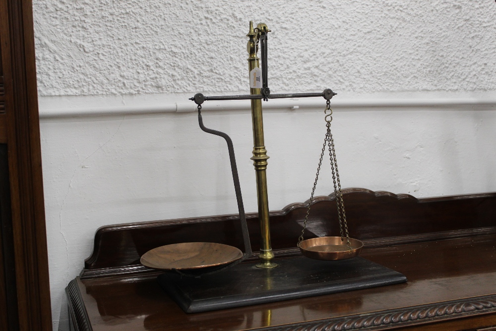 19th century set of balance scales with brass column support and copper weighing pans