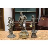 Three metal figurines,