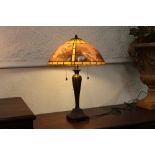 Tiffany style table lamp with bird pattern shade,