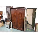 A Victorian mahogany wardrobe opening to five short and one long drawer, height 203 cm,
