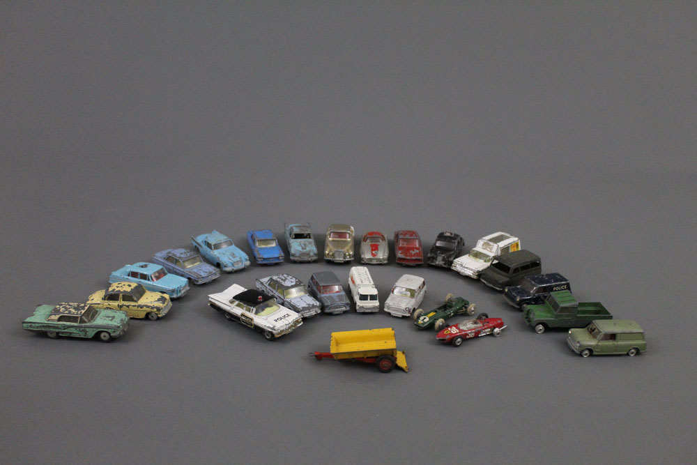 Twenty four 1950's/60's Corgi die cast model vehicles and trailer.