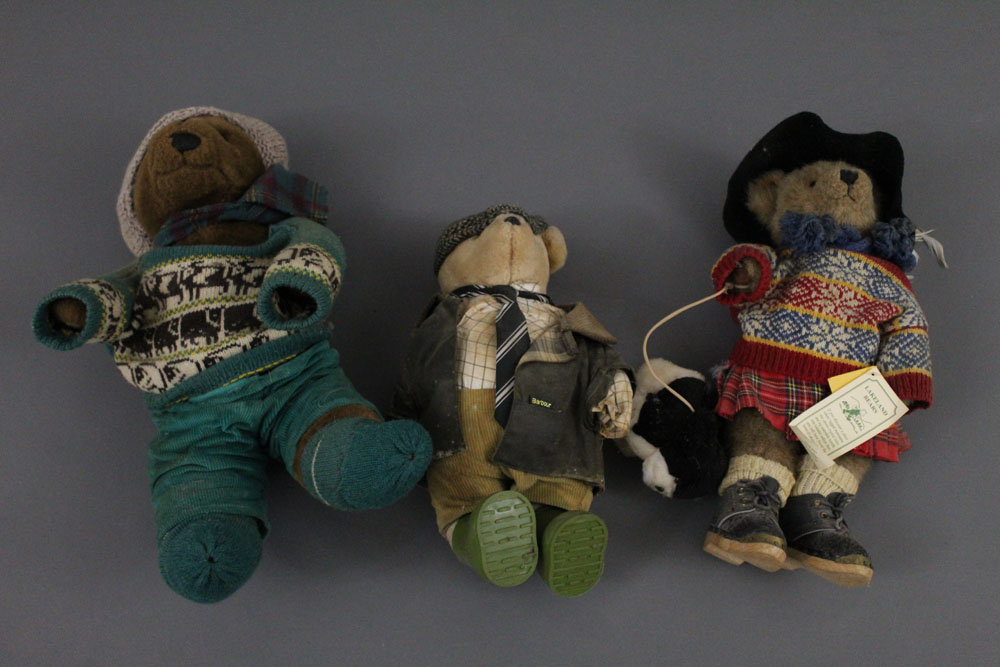 A group of three Lakeland Bears teddy bears, all having plush covered bodies,