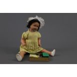 A large composition doll, early to mid 20th century, possibly by Ideal, having sleep eyes,