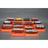 A group of fourteen Marklin HO scale wagons and rolling stock, to comprise Esso Shell wagons,