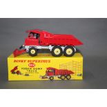 A Dinky Foden dump truck with bulldozer blade (959), in red,
