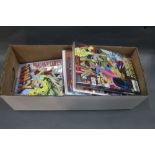 A box of +/- DC and Marvel comics,