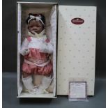 An Ashton-Drake Galleries vinyl artist's doll, by Waltraud Hanl, "Jasmine's First Birthday",