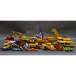 A box of mixed vintage and modern diecast, mainly construction vehicles, and to include Siku,