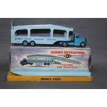 A Dinky Pullmore car transporter (982), and a loading ramp (794),