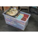 A tub of early 20th century board games, parlour games, jigsaw puzzles, and other games,