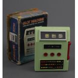 A 1970s Japanese Waco hand held cordless electric slot machine,