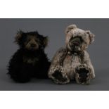 Two soft plush Charlie Bears, one with bell trimmed brown collar, the tallest measuring 32 cm.