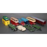 A small group of Dinky diecast model vehicles and sold together with a single 00 gauge 8 wheeled