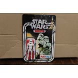 A Palitoy Star Wars Storm Trooper 3 3/4in action figure, with laser rifle,