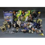 A group of Star Wars related toys, to include Hasbro and other boxed action figures,