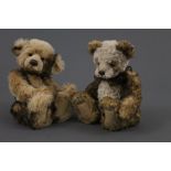 Two soft plush Charlie Bears, one with satin brown bow around its neck, the tallest measuring 36 cm.