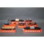 A group of seven Marklin HO scale wagons and rolling stock, to include a Tiefladewagen freight car,