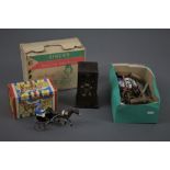 A vintage 1960's Sew Handy Singer seeing machine, a Spanish Trotador clockwork horse toy,