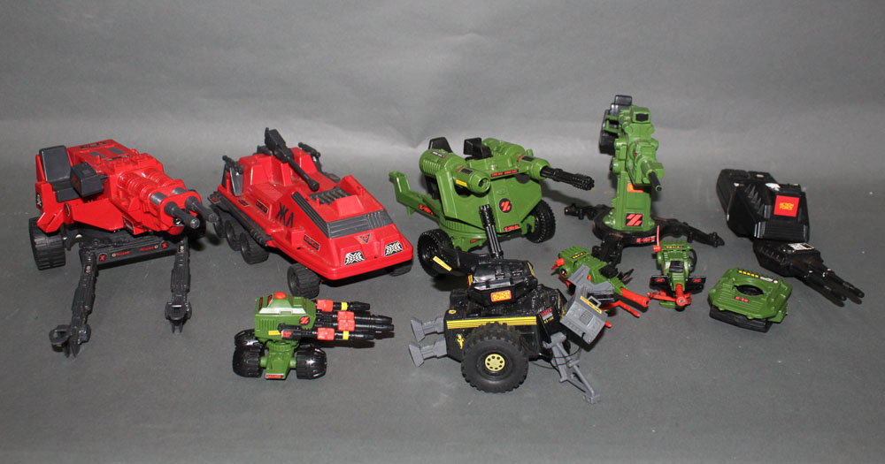 A group of Action Force and GI Joe vehicles and weapons,