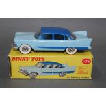 A Dinky Plymouth Plaza (178), having a light blue body, a dark blue roof and side flash,