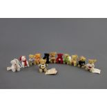 A group of twelve Steiff 'Historical Miniatures' teddy bear christmas ornaments, of varying colours,
