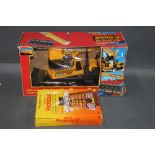 A boxed Kidimates battery operated Super Crane with 6ft control line,