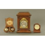 An early 20th century German walnut wall alarm clock,