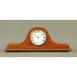 An Edwardian inlaid oak mantle clock, with single train movement,