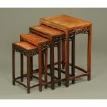 A nest of four Chinese rosewood rectangular occasional tables,