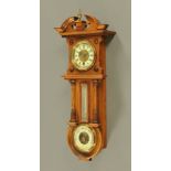 A Victorian stained beechwood combined wall timepiece, thermometer and barometer,