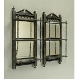 A pair of late Victorian ebonised three tier wall shelves of aesthetic design,