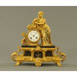 A 19th century French gilt clock,