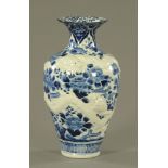 A Japanese blue and white Harido Meiji period relief moulded dragon vase. Height 37 cm.