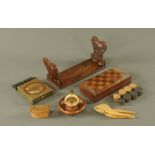 A Victorian rosewood folding book slide, together with a checkerboard and roulette game,