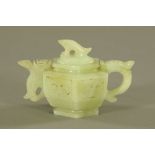 A Chinese jade hexagonal teapot, with incised decoration. Height 9.5 cm, length 14.5 cm.