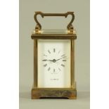 An English brass carriage clock, timepiece only,