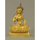 A Sino-Tibetan gilt bronze Buddhist prayer statuette of Tara, with original undisturbed base plate.