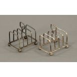 A pair of George V silver four division miniature toast racks, by Henry Atkin.