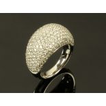 An 18 ct white gold diamond set Bombe ring, diamond weight +/- 3.6 carats. Size N.