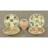 A small Imari vase and four Chinese dishes. Largest diameter 17 cm.