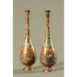 A pair of late 19th/early 20th century Chinese Qing dynasty baluster shaped cloisonne vases,
