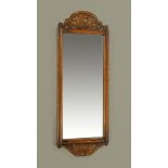 A Titchmarsh & Goodwin oak framed rectangular mirror, with leaf carved cresting and apron.